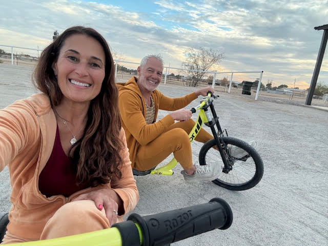 Sean and Tylene staying active by riding bikes outdoors